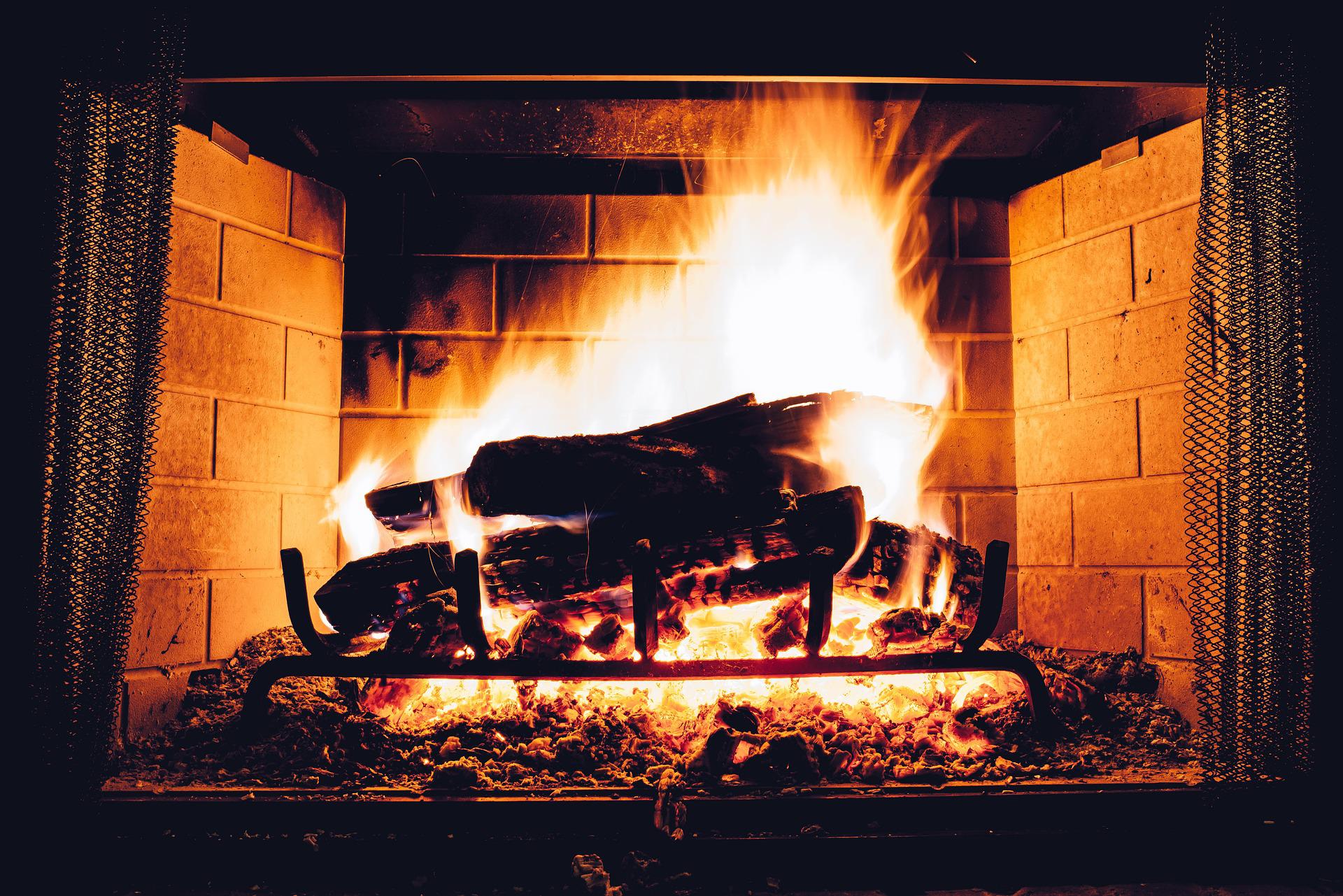 Fireplace with burning fire
